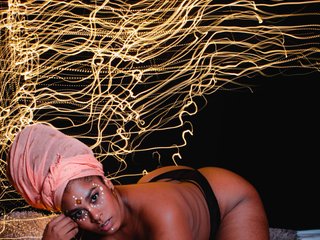 Foto av profilen african-doll